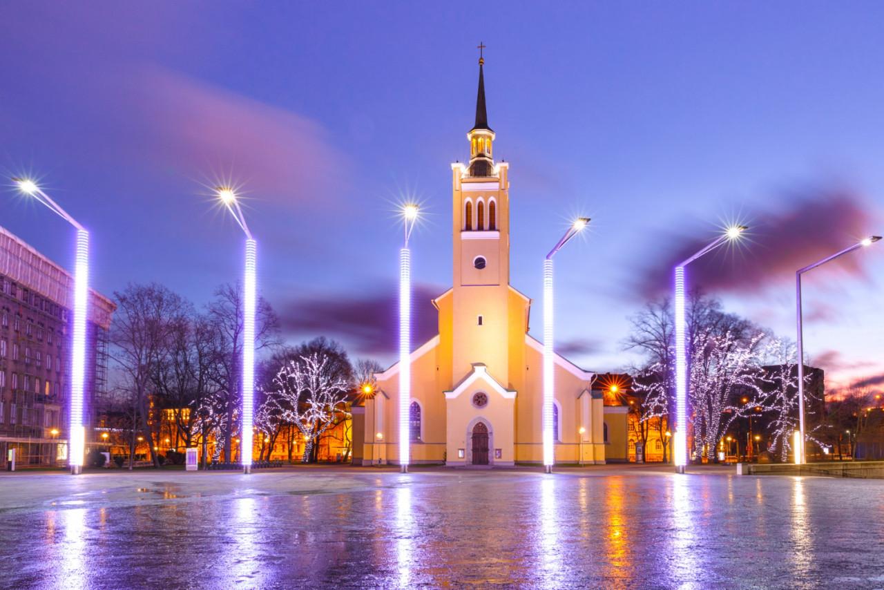 morning decorated illuminated christmas freedom square with st john s church tallinn sunrise estonia